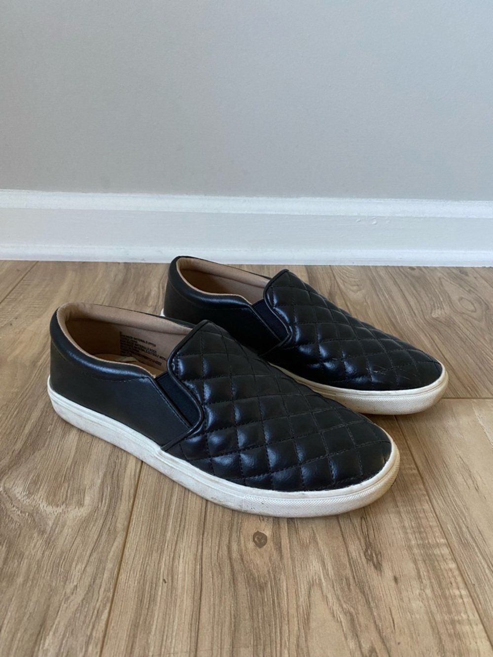 Black Leather Quilted Slip On Sneakers